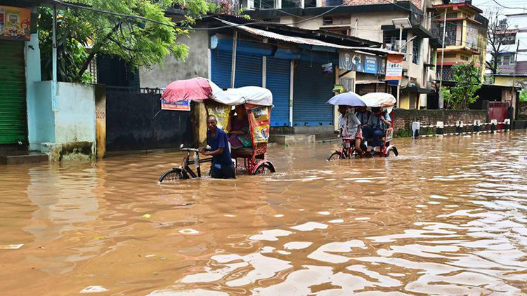 hindistanda sel ve heyelanlar 18 kisinin olumune yol acti G8VwHcTe